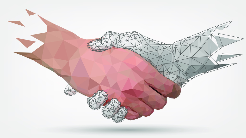Human hand shaking a network hand.